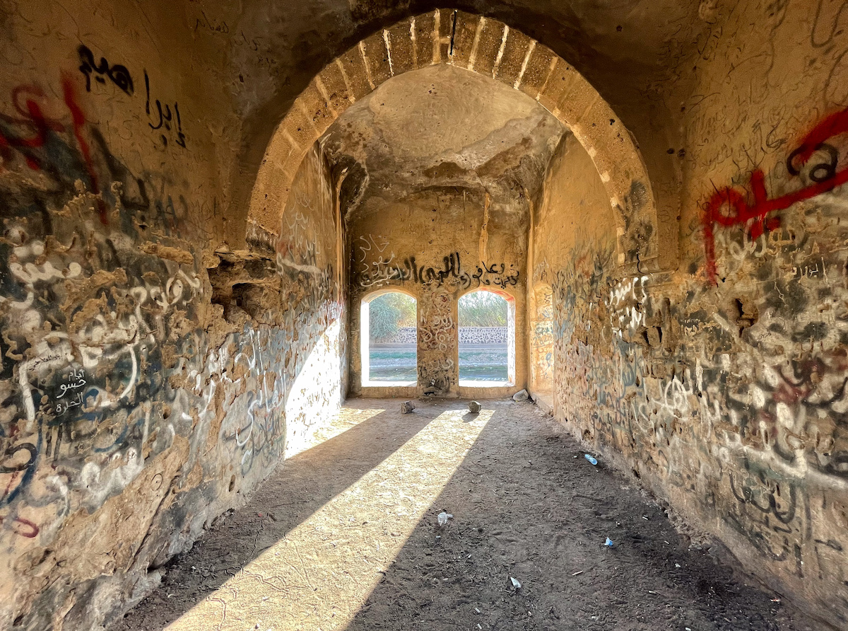 An interior covered in graffiti