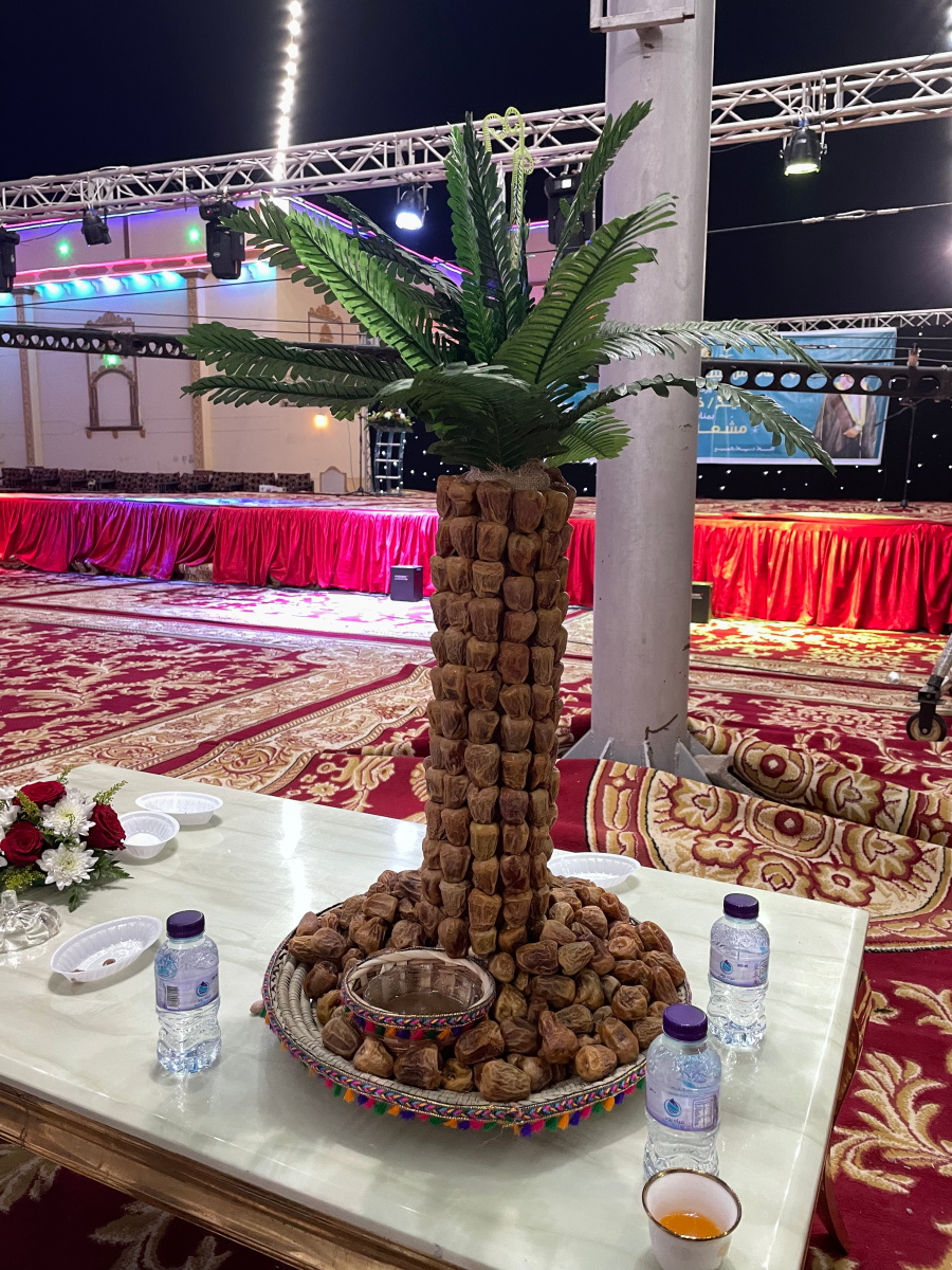 A decorative palm tree made out of dates