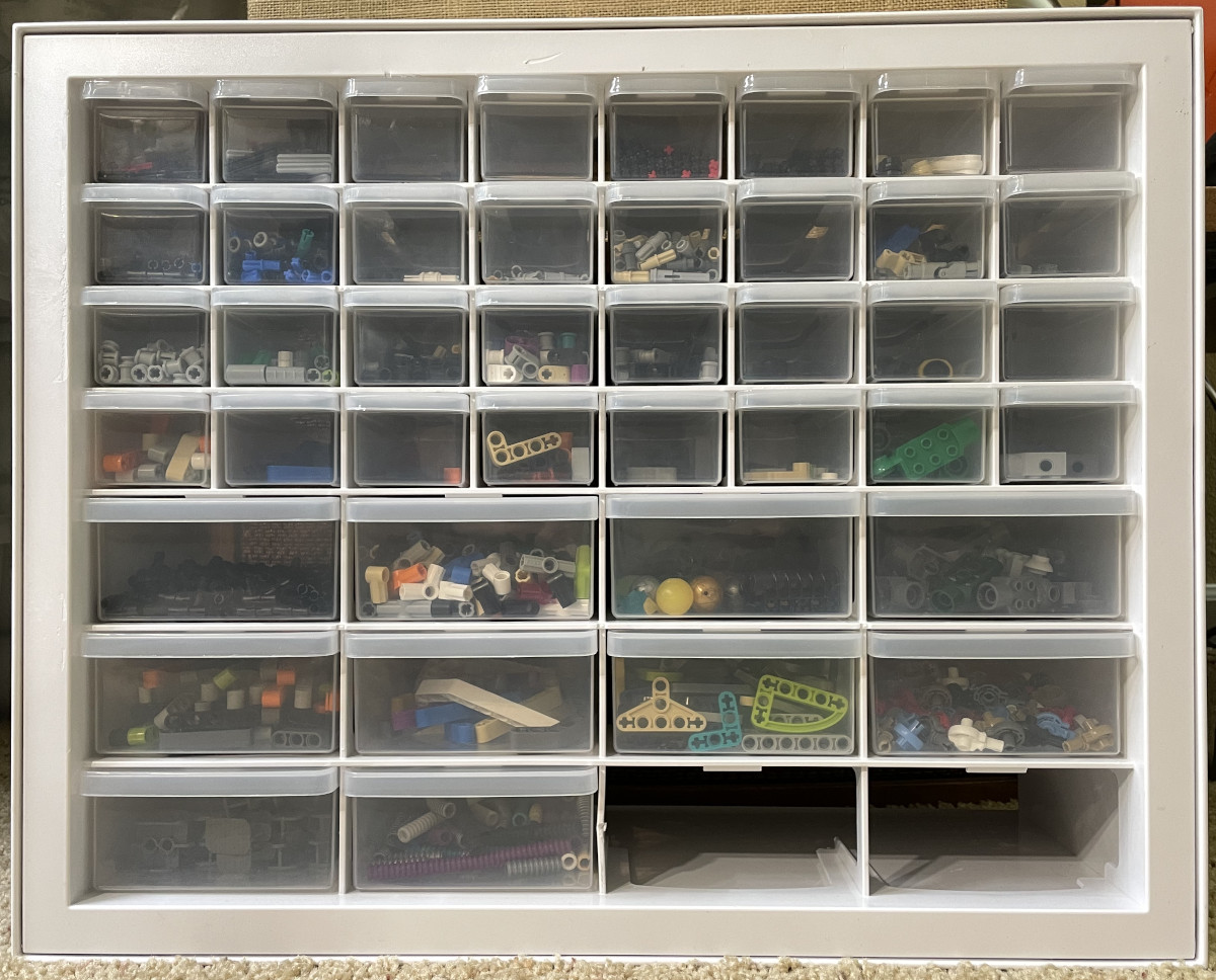 sorted LEGO pieces in drawers